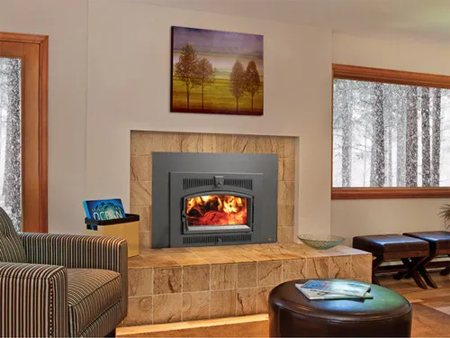 Lopi Medium Flushwood Arched Hybrid Wood Insert, a wood-burning fireplace insert with a glass door, installed in a fireplace surround with a lit fire visible