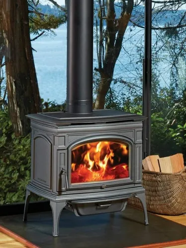 Lopi Rockport wood stove with a glass door, lit fire visible, in a showroom setting